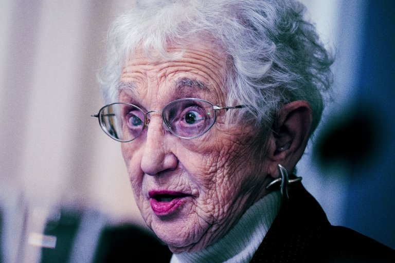 Close-up of North Carolinian politician Virginia Foxx. Her lips are slightly parted, and she appears to be speaking or reacting to something. The background is softly blurred.