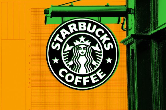 Starbucks Coffee circular sign with the iconic twin-tailed mermaid logo, mounted on a green bracket attached to a building. The background is an orange grid pattern. The sign is black and white with bold text.