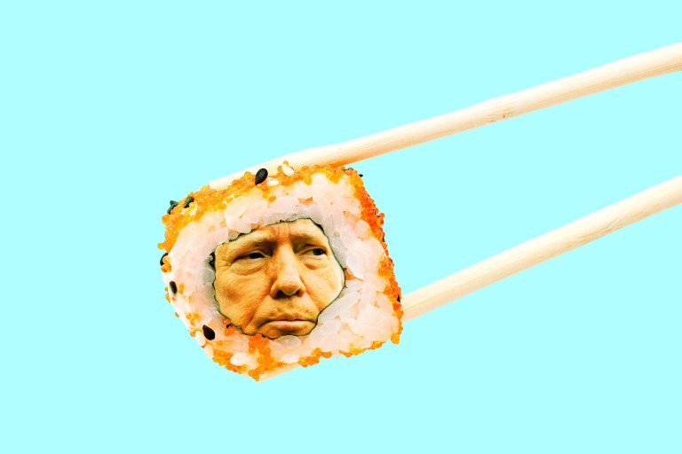 A piece of sushi held by wooden chopsticks against a light blue background, with the face of Donald Trump edited into the center of the sushi roll.