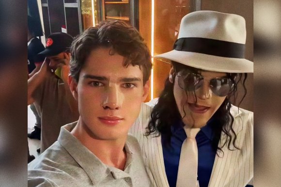 A screenshot from a TikTok video by Clavicular comparing his nose job jokingly to a Michael Jackson impersonator next to him.