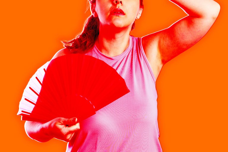 A photo illustration of an overheated woman fanning herself.