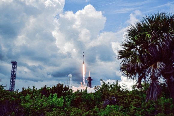 Photograph of a SpaceX Falcon 9 rocket taking off.