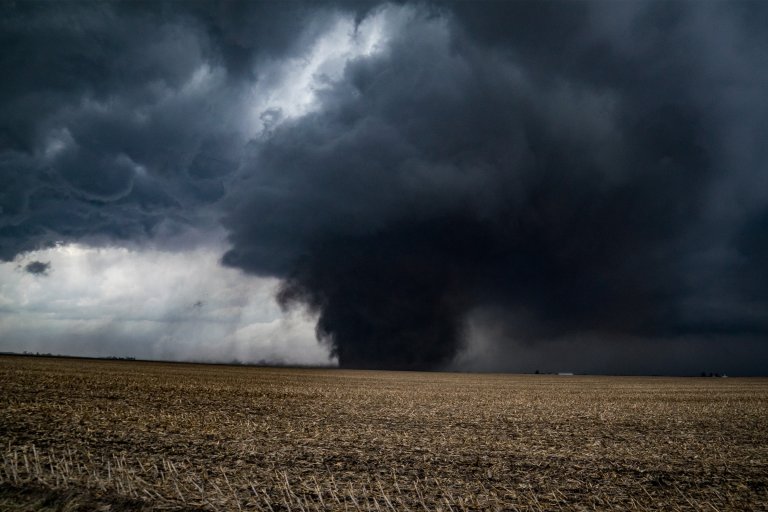 A dark and large EF-3 Tornado over Washburn, Illinois in 2017.
