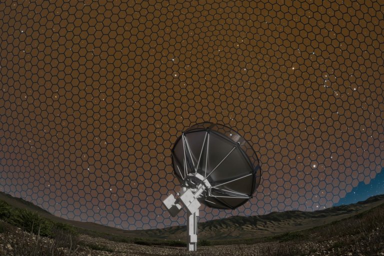 A screenshot of a video depicting a radio telescope as it scans the sky, depicted as a honeycomb pattern.