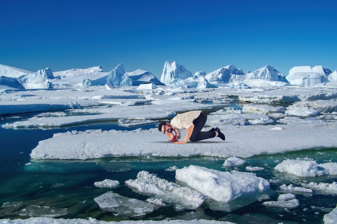 A comic photo illustration featuring a man on his hands and knees with his ear to the ground in an icy Antarctica landscape.