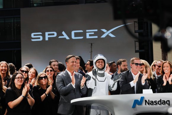 SpaceX employees celebrate the market close of the SpaceX initial public offering (IPO) at the Nasdaq Marketsite on June 12, 2026, in New York City.