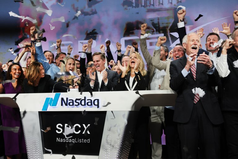SpaceX President Gwynne Shotwell celebrates with family and other SpaceX employees at the Nasdaq Marketsite in Times Square during the launch of the SpaceX initial public offering (IPO) on the Nasdaq.