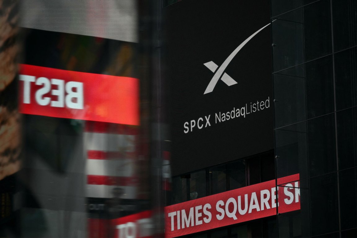 An ad for SpaceX is displayed on a screen at Times Square after the launch of SpaceX's initial public offering (IPO) in New York on June 12, 2026.