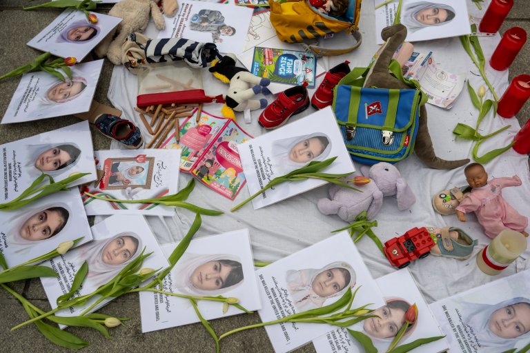 Portraits commemorating the girls who died in the bombing of a girls' school in Iran.