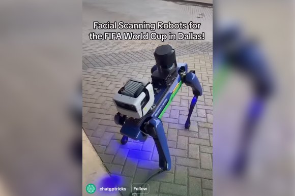 Screenshot of a purple and green Boston Dynamics Robotic Dog bowing toward the camera.