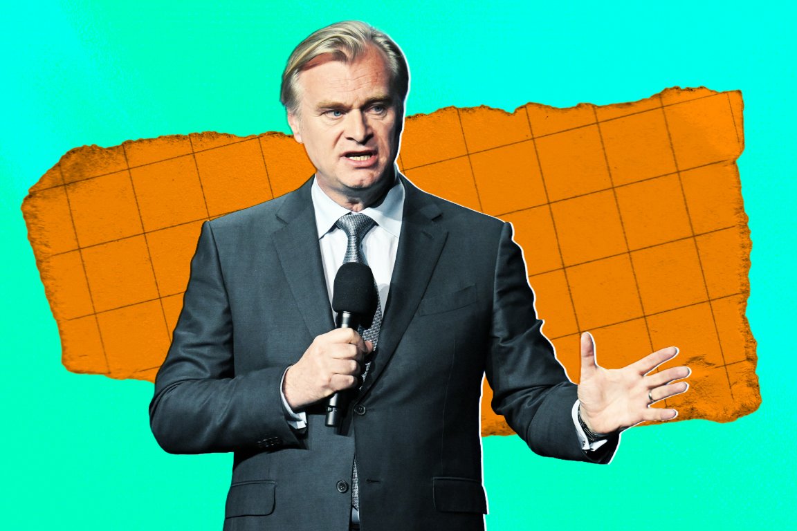A man in a dark suit and tie holding a microphone, gesturing with his other hand. The background is bright turquoise with an orange, grid-patterned torn paper shape behind him.
