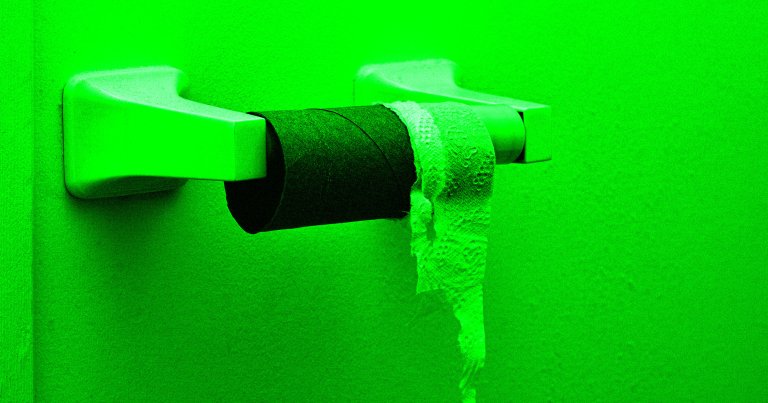 A color-treated photo of a used up toilet paper roll.