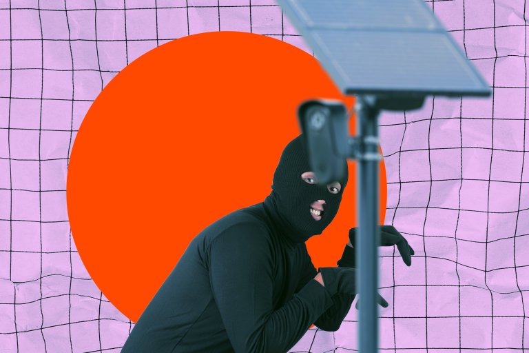 A photo illustration featuring a flock camera in the foreground while a thief in a balaclava sneaks behind it with a smile on his face.