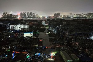 Armed police officers carry out rescue operations following a tornado on July 6, 2026 in Huangzhou, Huanggang, Hubei Province of China.
