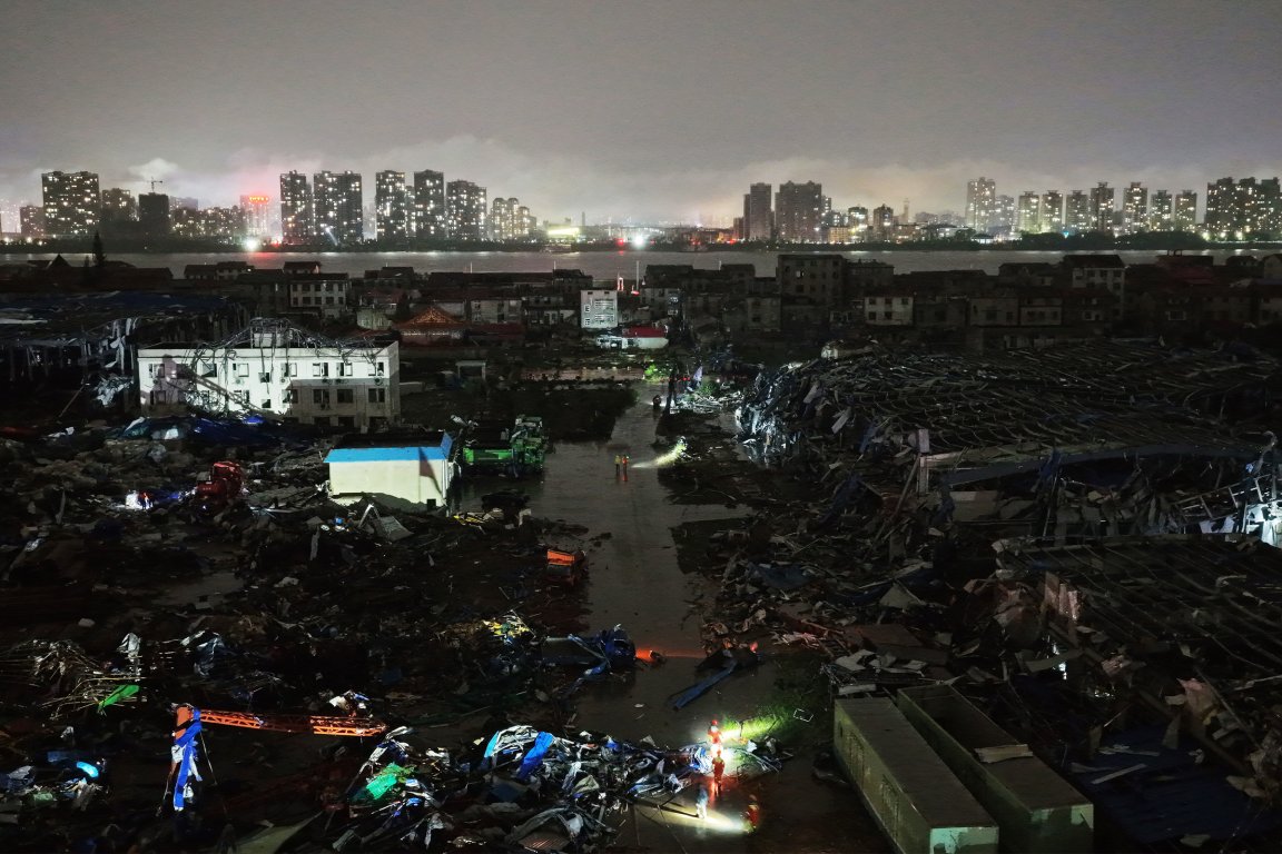Armed police officers carry out rescue operations following a tornado on July 6, 2026 in Huangzhou, Huanggang, Hubei Province of China.