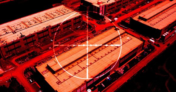 A color treated photo of a data center with crosshairs.