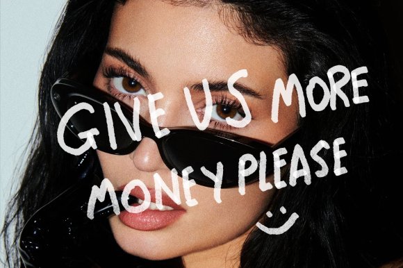 A still from Meta's ad campaign featuring Kylie Jenner. Written over it in crude white marker is "GIVE US MORE MONEY PLEASE :)"