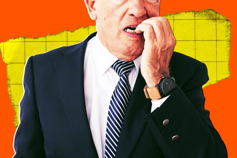 A photo illustration of a businessman biting his nails anxiously.