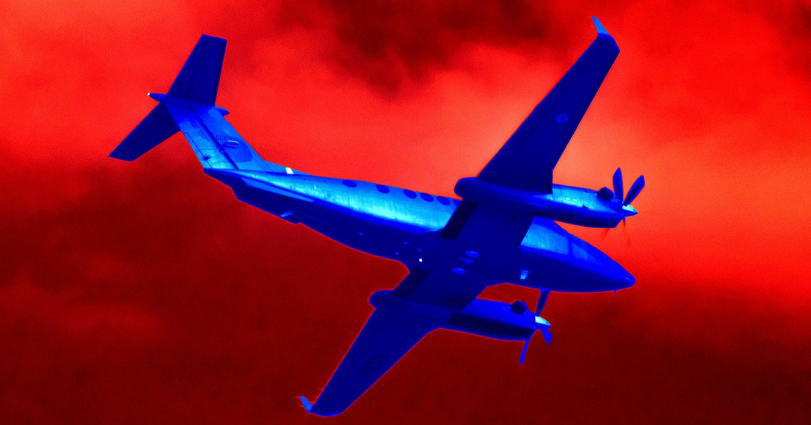 A color-treated photo of a twin-engine aircraft.
