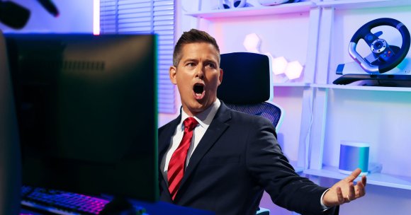 A photo illustration of Sean Duffy at a gaming computer.