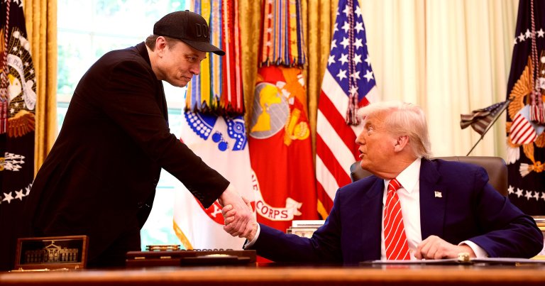 Tesla CEO Elon Musk shakes hands with U.S. President Donald Trump as they speak to reporters in the Oval Office of the White House.