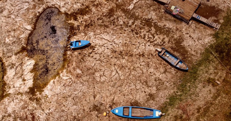 An aerial photograph taken on July 22, 2026 shows boats laying on the dried Danube river bed.
