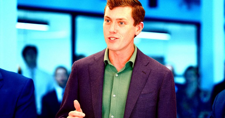 Garrett Langley, CEO and co-founder of Flock Safety, speaks during a ribbon cutting for the Seaport District headquarters.