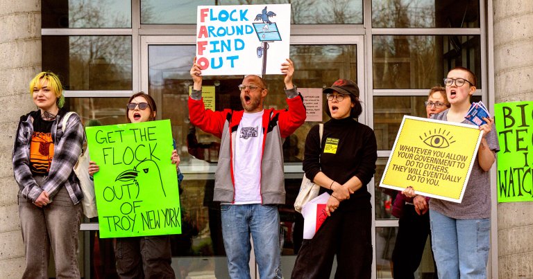 Protesters rally against the use of Flock cameras on Friday, April 3, 2026, outside City Hall in Troy, NY.