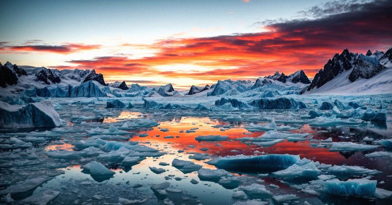 A stark image of a melting ice cap with jagged edges.