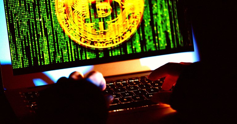 A photo illustration of a Bitcoin hacker.