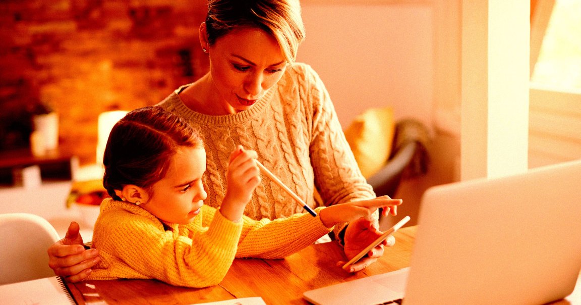 A color-treated photo of a woman and a child looking at a smartphone.