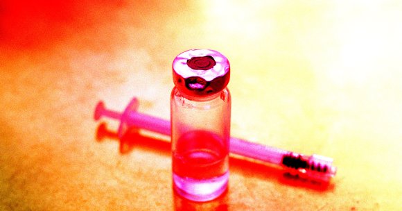 A vial of retatutride on a table.