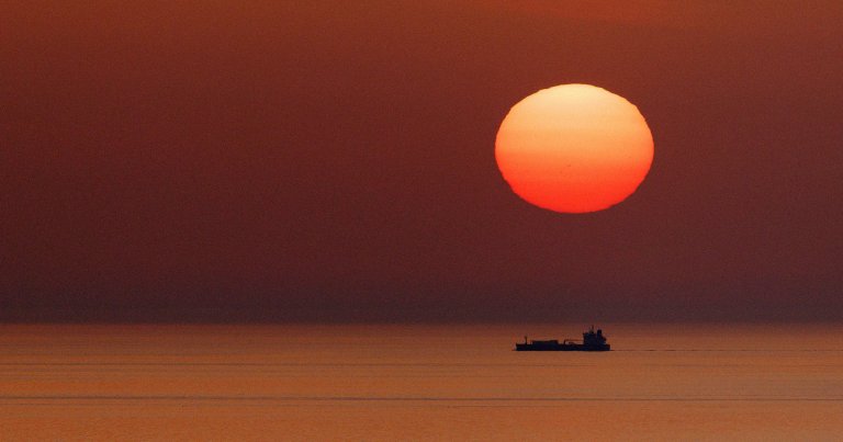 The sun rises over the North Sea seen from the RSPB's Bempton Cliffs reserve on the East Yorkshire coast.
