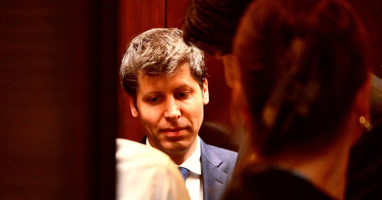 Open AI CEO Sam Altman gets into an elevator on Capitol Hill.