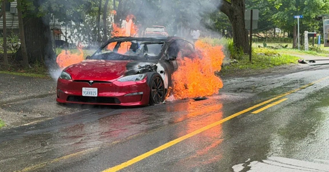 A photo provided by the fire department shows a Tesla Model S that has burst into flames.