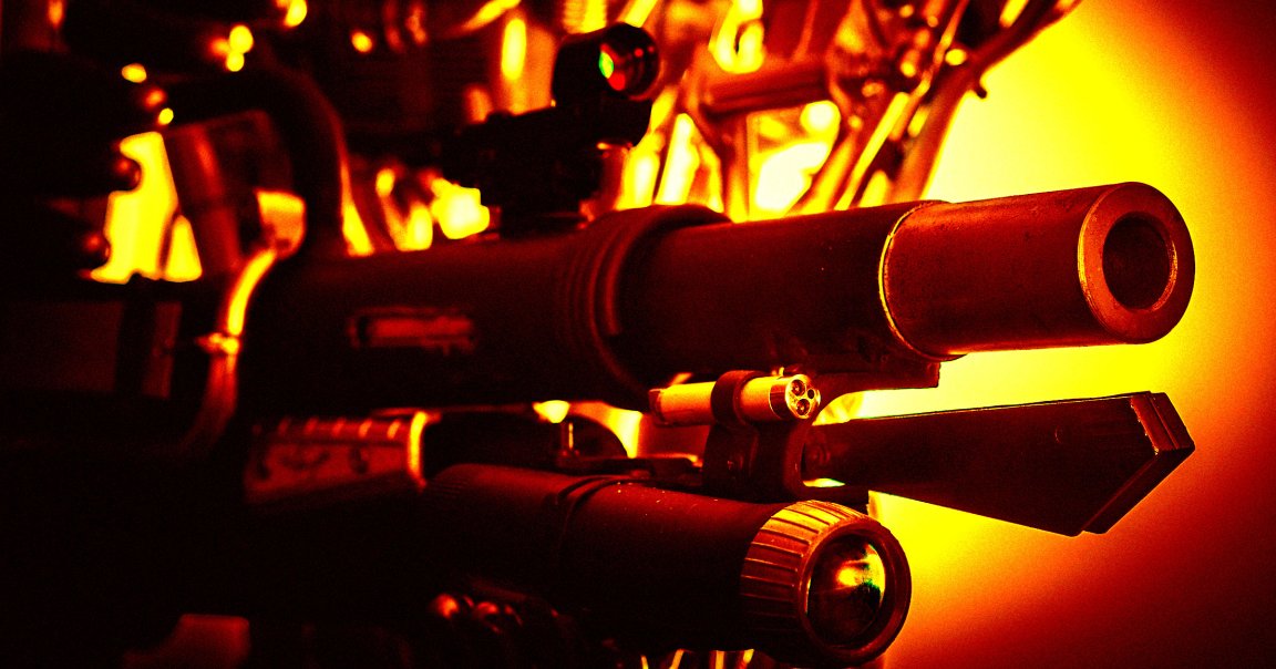 A color-treated photo of a gun barrel.