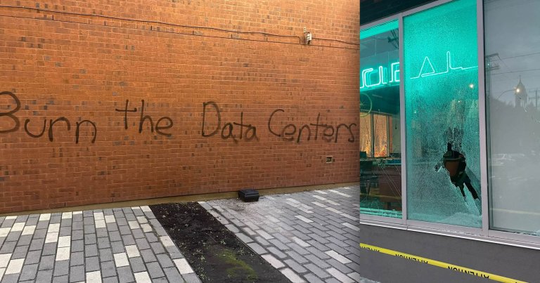 A pair of photos show an AI facility defaced by protestors in Montreal.