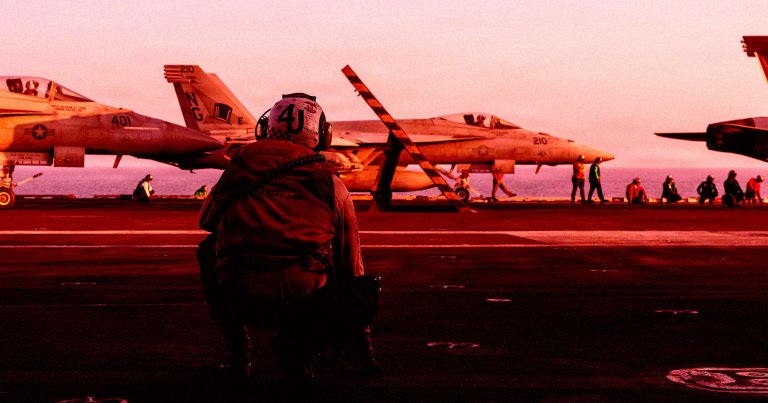 An F/A-18E Super Hornet, attached to Strike Fighter Squadron (VFA) 14, prepares to take off.