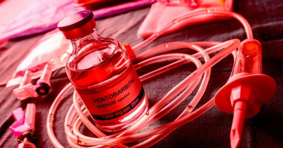 A lethal injection vial and needle.