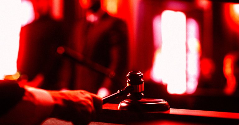 A judge using his gavel in court.