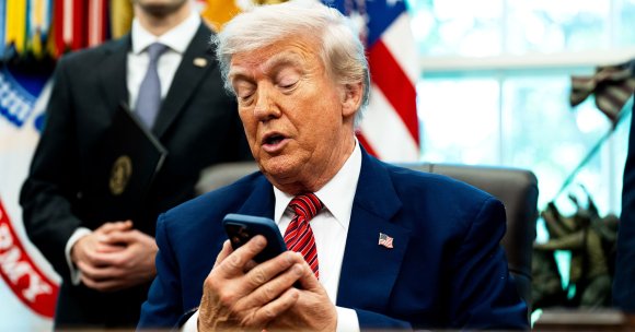 US President Donald Trump silenced his cellphone in the Oval Office of the White House.