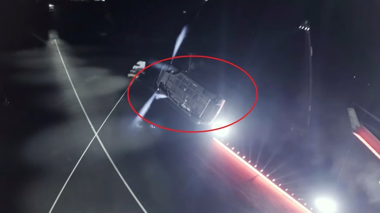 A screenshot of Tesla's "flying Roadster" demo, showing the vehicle's strange-looking underside.