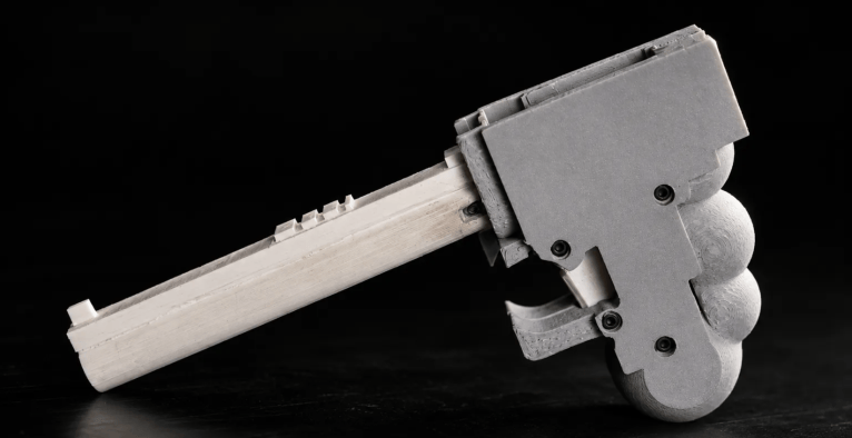 An image shows what Cody Wilson claims is the first gun designed by AI.