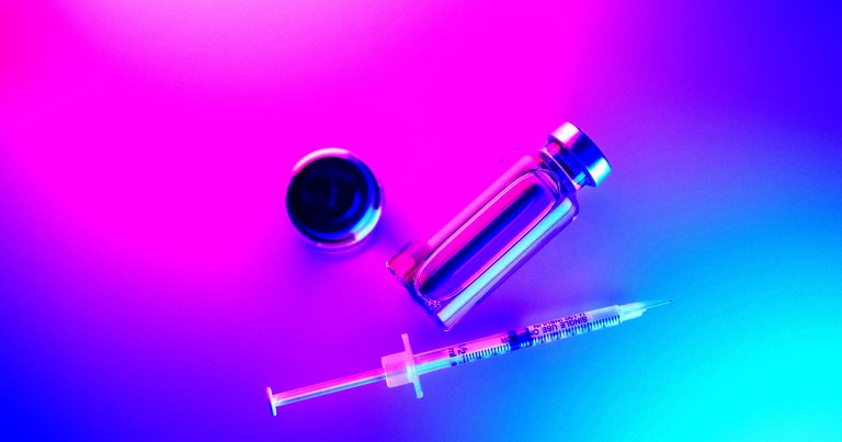 A color-treated photo of a syringe.