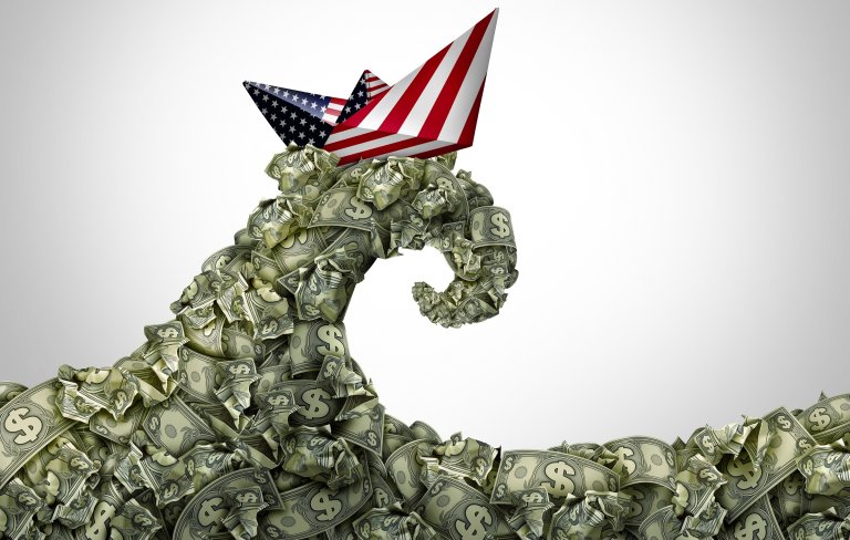 An illustration shows a tentacle of money wearing an American flag hat.