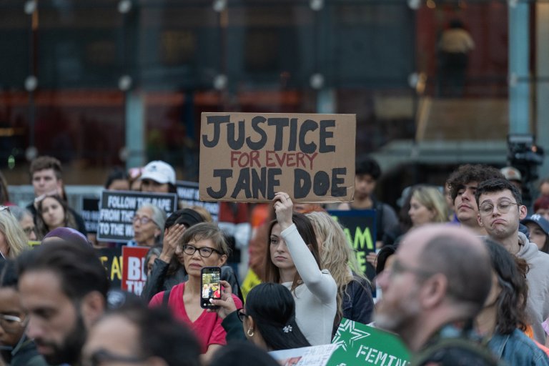 A photo shows protesters supporting Jane Doe, who alleges that she was sexually assaulted at a Cornell fraternity.