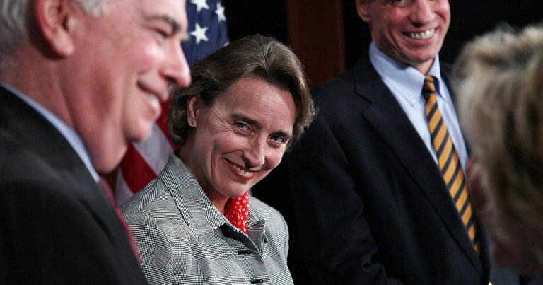 Sen. Blanche Lincoln (D-AR) (2L) smiles with Sen. Christopher Dodd (D-CT) (L), Sen. Mark Warner (D-VA) (2R) and Sen. Barbara Boxer (D-CA), after voting to pass Wall Street reform, on May 20, 2010.