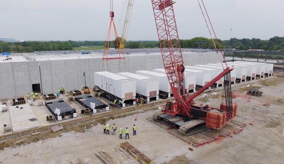 A photo shows an AI data center under construction in Texas.