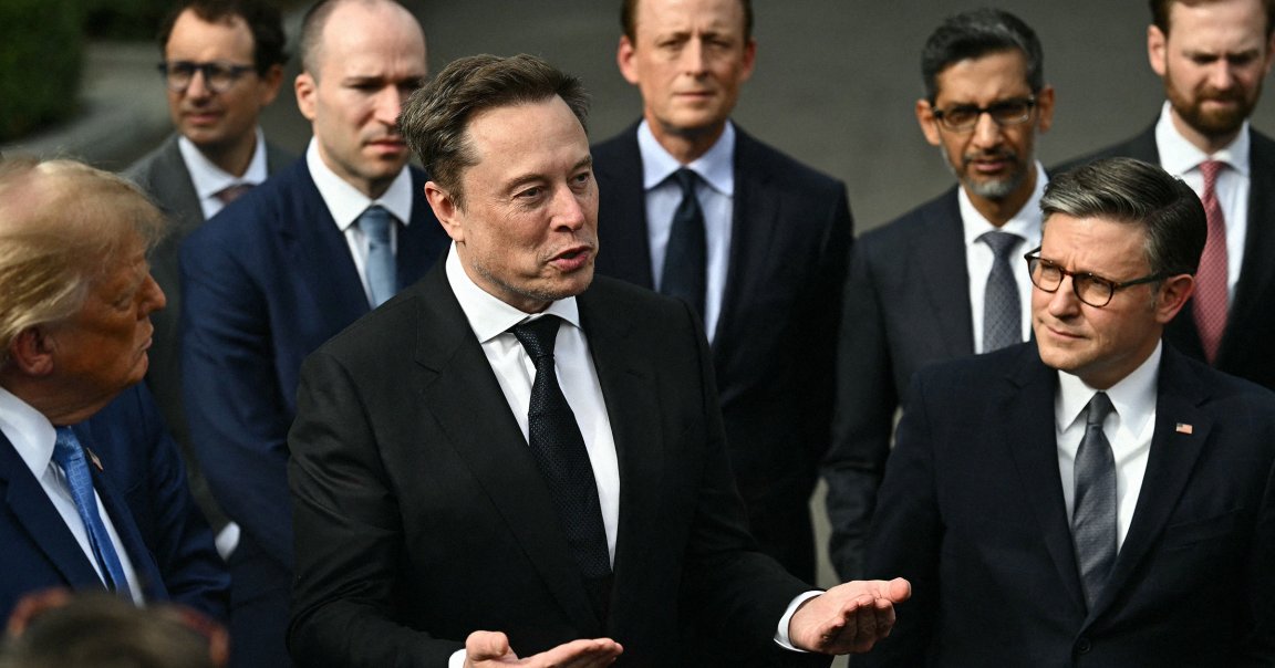 US President Donald Trump and US Speaker of the House Mike Johnson (R) look on as CEO of Tesla and SpaceX Elon Musk speaks to the press.